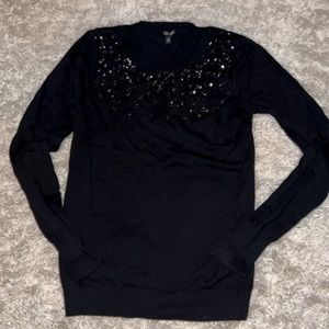 Express sweater with sequence detail. New without tags